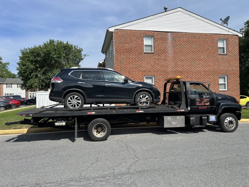 I Got Whipz Towing & Roadside Assistance with a black nissan rogue suv towing near me from 5 Top View CT Windosr Mill,MD 21244 to 8800 Stanford Blvd, Columbia, MD 21045