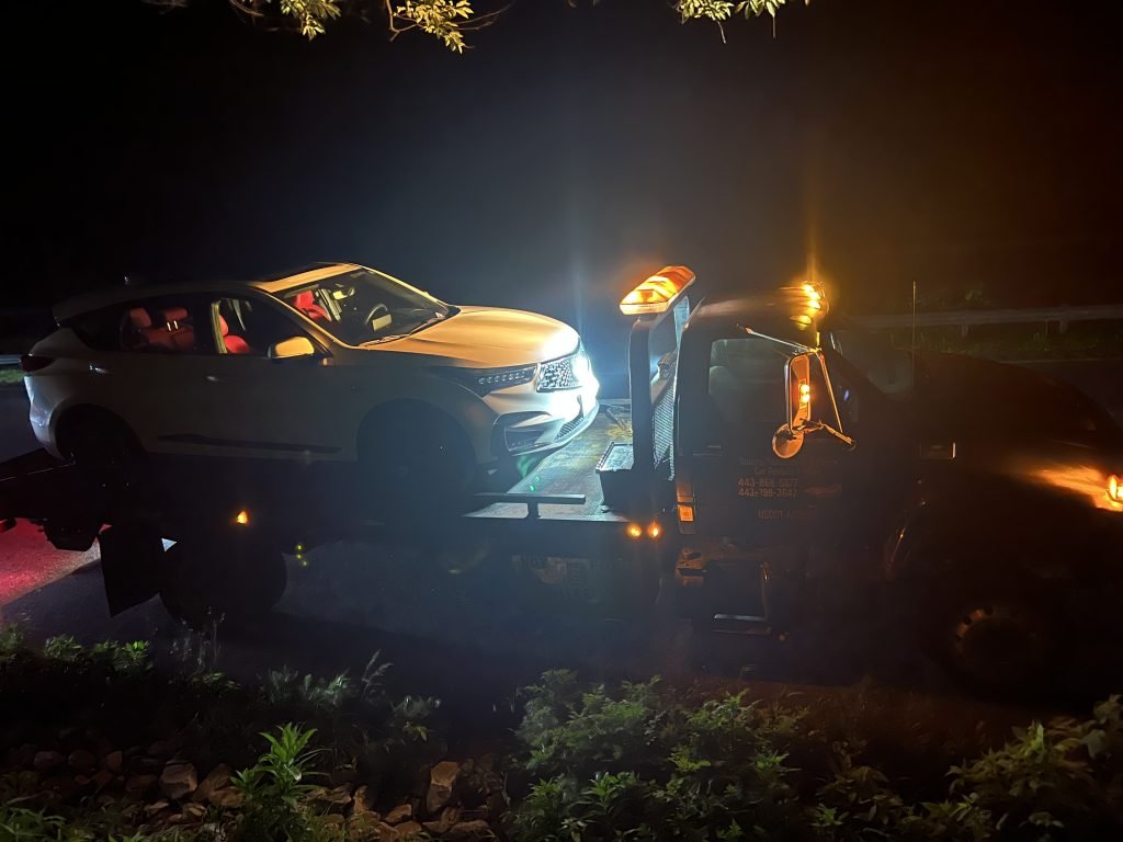 I Got Whipz Towing & Roadside Assistance with a White Acura MDX suv towing near me from 39.58336 N, 76.67729 W to 39.432897, -76.793093