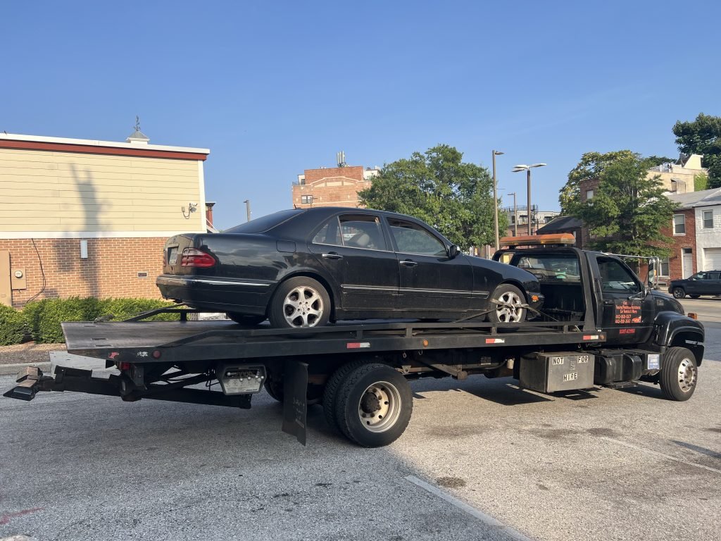 I Got Whipz Towing & Roadside Assistance with a blk mercedes-benz e series sedan towing near me from 2036 Eastern Ave, Baltimore, MD 21231 to 2805 Oakley Ave Baltimore, MD 21215