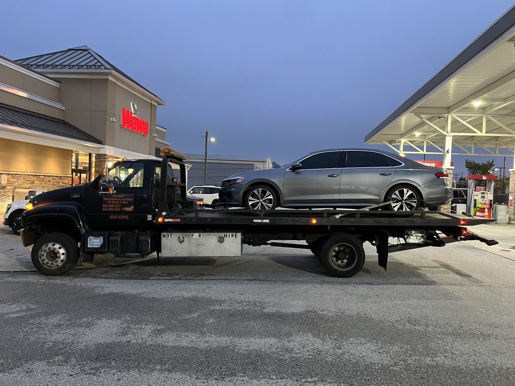 I Got Whipz Towing & Roadside Assistance with a grey Volkswagen Jetta sedan towing near me from 4901 Boston st Baltimore,MD 21224