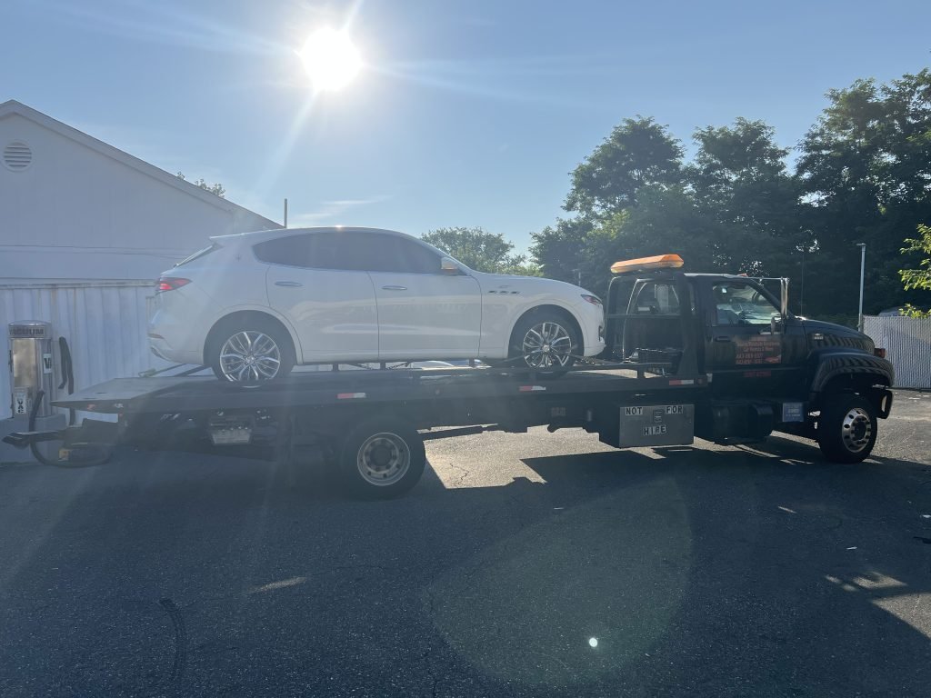 I Got Whipz Towing & Roadside Assistance with a white Maserati towing near me from 1699 Forest Park Ave, Baltimore, MD 21207 to 6227 Belair Rd, Baltimore, MD 21206