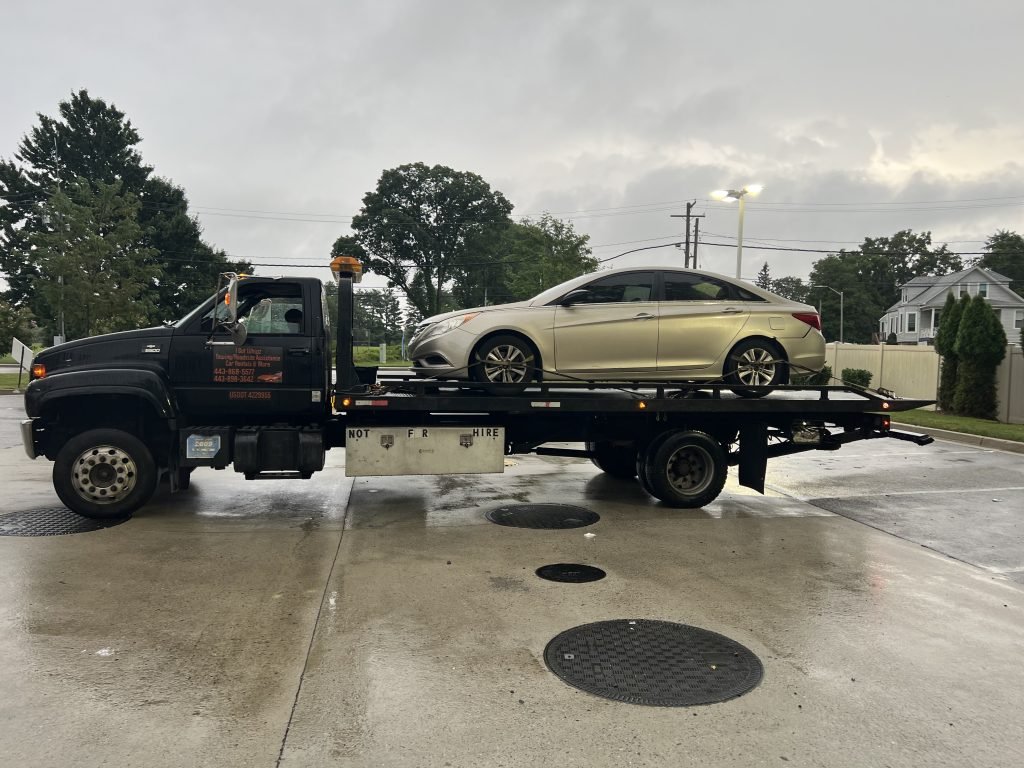 I Got Whipz Towing & Roadside Assistance with a gold hyundai sonata sedan towing near me from 2000 N Forest Park Ave, Baltimore, MD 21207 to 5234 hersperus Dr Columbia,MD 21044