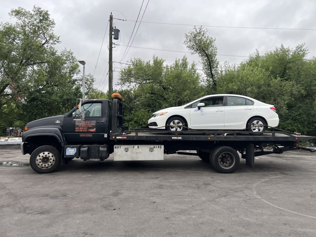 I Got Whipz Towing & Roadside Assistance with a white honda civic sedan towing near me from 239.347960, -76.743808 to 6386 York RD Baltimore,MD 21212