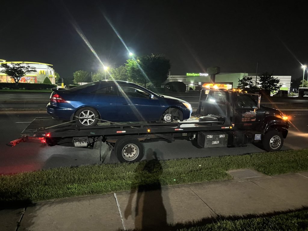I Got Whipz Towing & Roadside Assistance with a silver chrylser town & country van towing near me from 39.312782, -76.748311 to 3600 Forest Grove ave Lochearn,MD 21207
