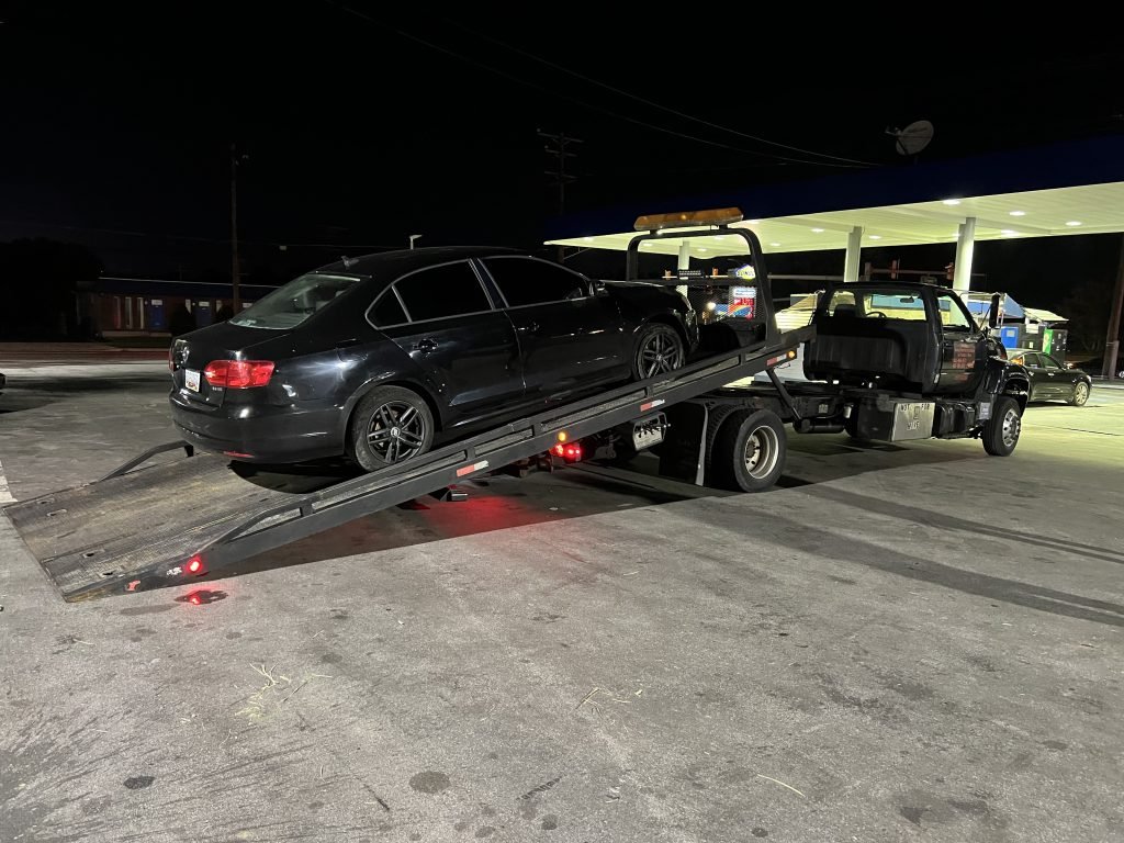 I Got Whipz Towing & Roadside Assistance with a blk volkswagen jetta sedan towing near me from 39.344745, -76.744889 to 7409 Liberty Rd, Gwynn Oak, MD 21207