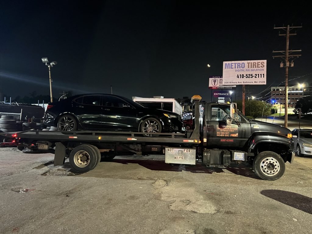 I Got Whipz Towing & Roadside Assistance with a black acura rlx sedan towing near me from 39.296623, -76.831566 to 3506 Wilkens Ave, Baltimore, MD 21229