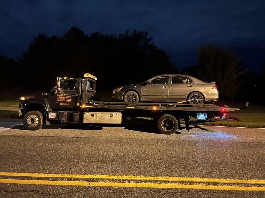 I Got Whipz Towing & Roadside Assistance with a grey honda sedan towing near me from 7804 Shadow Knoll Ct, Baltimore, MD 21236 to 4010 Hayward Ave, Baltimore, MD 21215