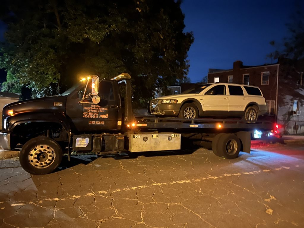 I Got Whipz Towing & Roadside Assistance with a white volvo xc wagon towing near me from 3450 silver hill ave Gwynn Oak,MD 21207 to 4300 Kathland ave Gwynn Oak, MD 21207