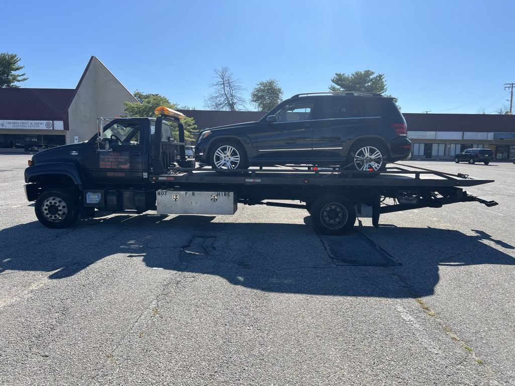 I Got Whipz Towing & Roadside Assistance with a blk Mercedes GLK350 truck towing near me from 1724 Woodlawn Dr, Woodlawn, MD 21207 to 3600 Oak ave Lochearn,MD 21207