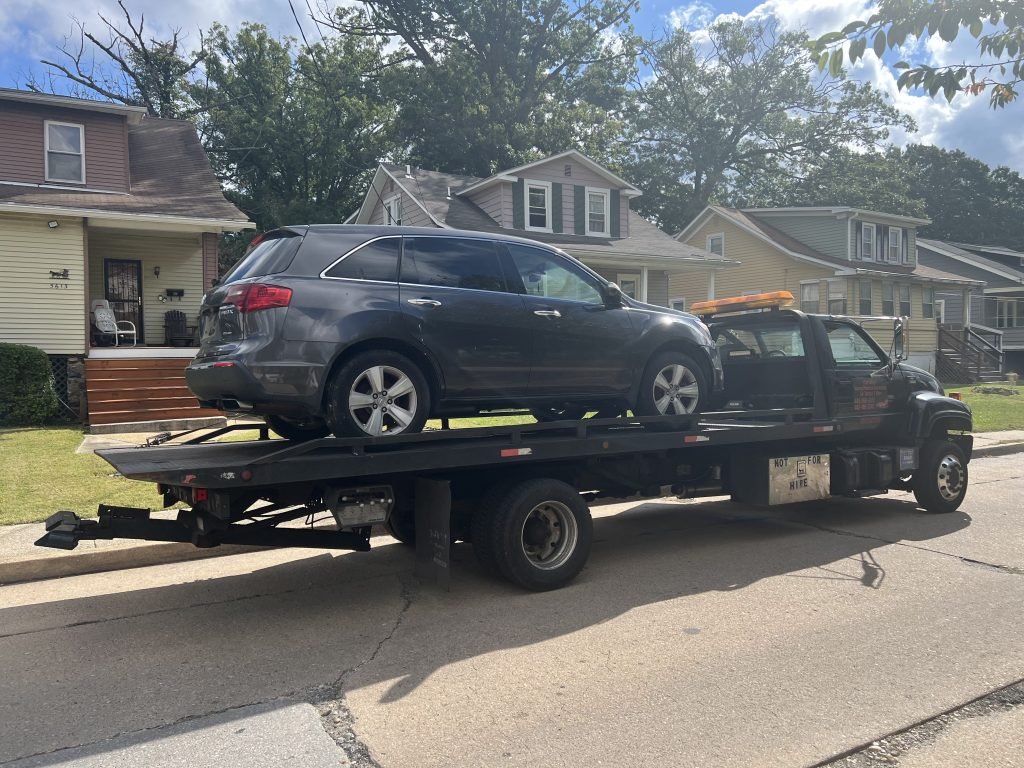 I Got Whipz Towing & Roadside Assistance with a grey Acura MDX truck towing near me from 5600 Gist ave Baltimore, MD 21215 to 5000 Gwynn Oak Ave Baltimore,MD 21207