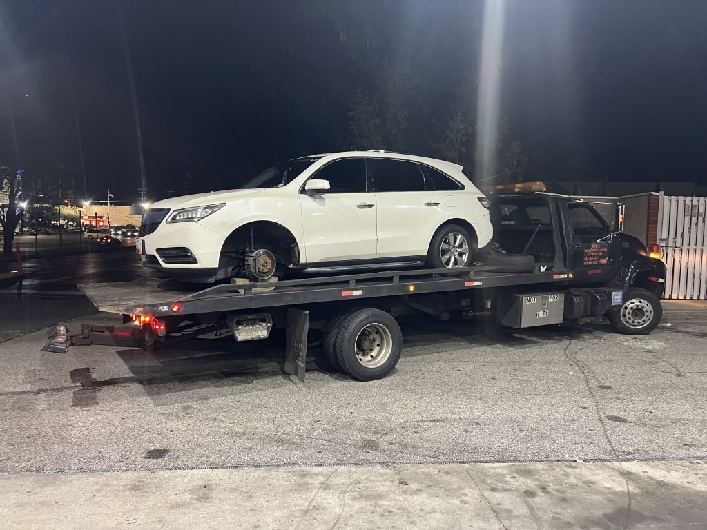 I Got Whipz Towing & Roadside Assistance with a white Acura MDX sedan towing near me from 5668 Baltimore National Pike, Catonsville, MD 21228 to 1127 Ingleside ave, Woodlawn, MD 21207