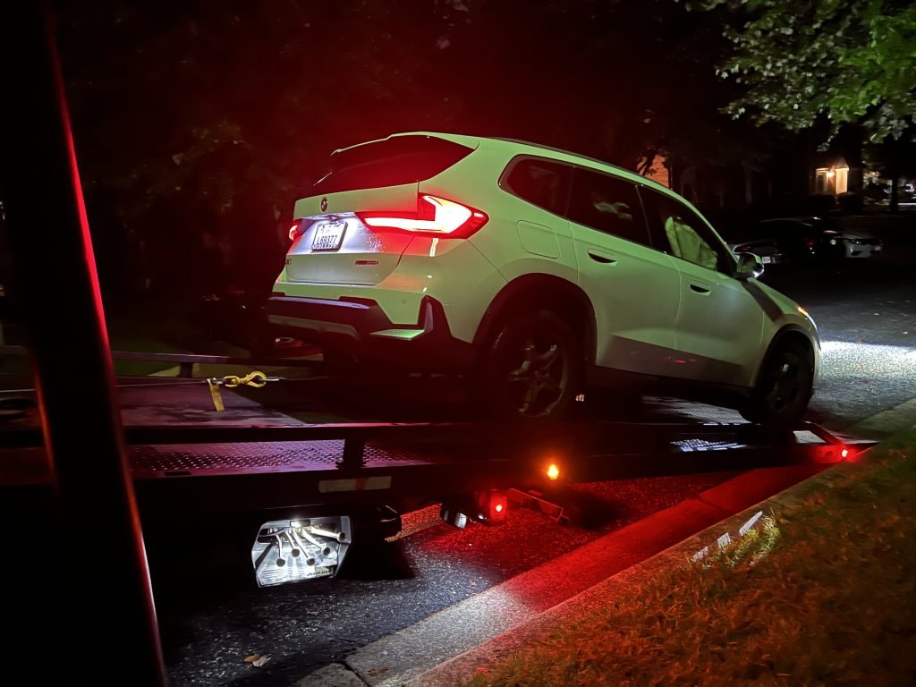 I Got Whipz Towing & Roadside Assistance with a white BMW X1 truck towing near me from 39.4057072,-76.8124746 to 4906 Lockard Dr Owings Mills, Maryland 21117