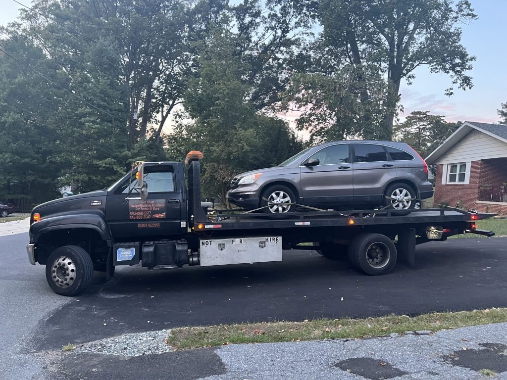 I Got Whipz Towing & Roadside Assistance with a brown honda cr-v suv towing near me from 13000 lutes dr Silver Spring, MD 20906 to 3920 Vero Rd L, Arbutus, MD 21227