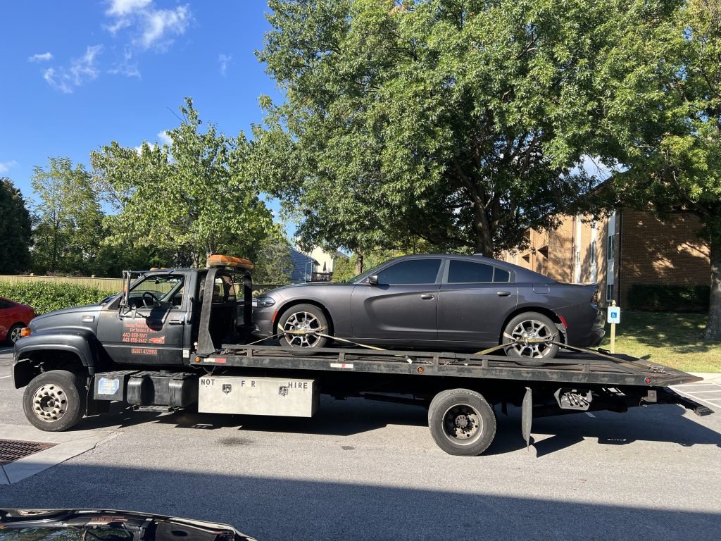 I Got Whipz Towing & Roadside Assistance with a grey dodge charger sedan towing near me from 2007 Richglen DrGwynn Oak, MD 21207 to 11212 Reisterstown Rd Suite A, Owings Mills, MD 21117