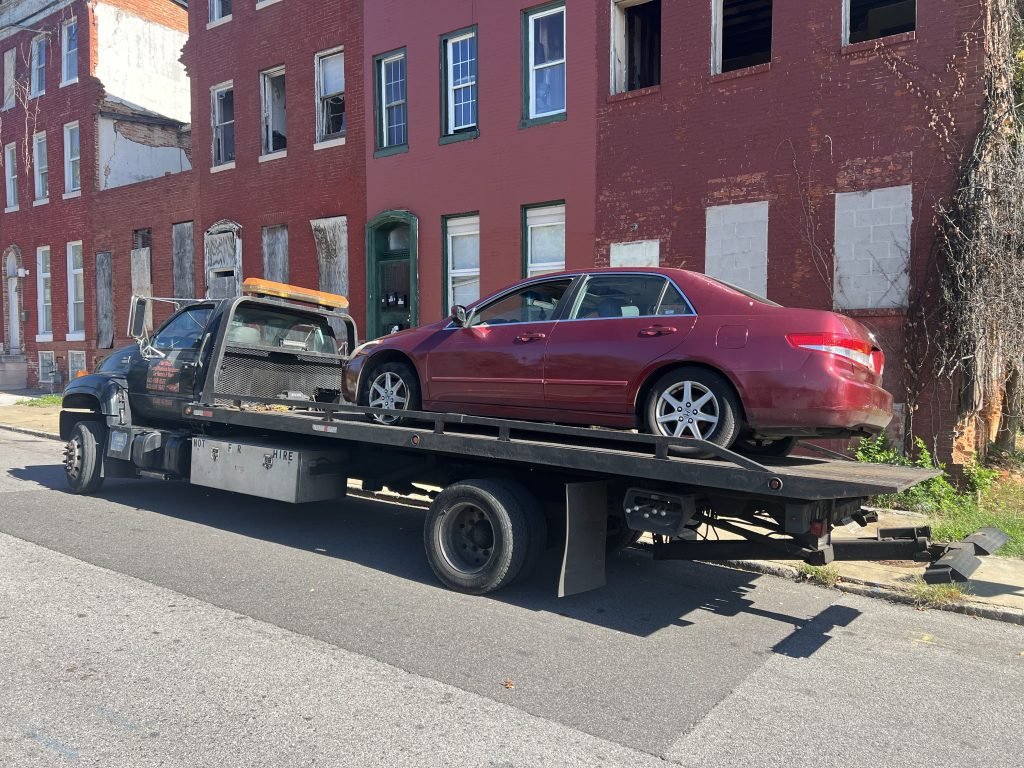 I Got Whipz Towing & Roadside Assistance with a red honda accord sedan towing near me from 701 Gold St, Baltimore, MD 21217 to 1104 Gregory Ave, Woodlawn, MD 21207