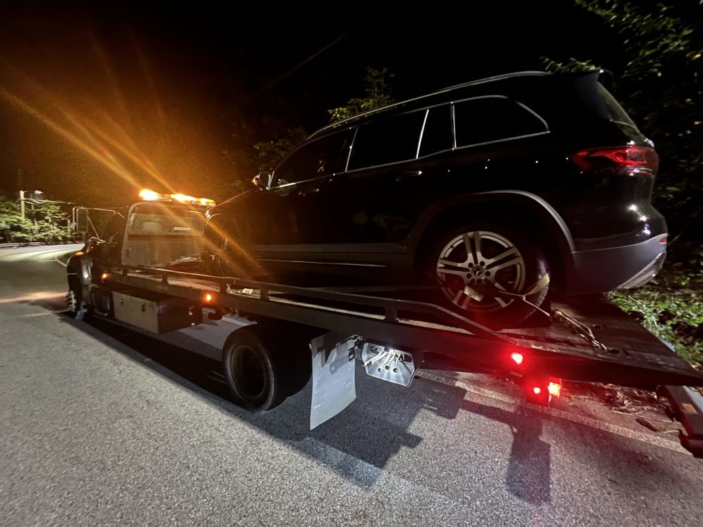 I Got Whipz Towing & Roadside Assistance with a black mercedes-benz gle320 suv towing near me from 39.304715, -76.687275 to 10 Cedar Heights Ct Lochearn, MD 21207