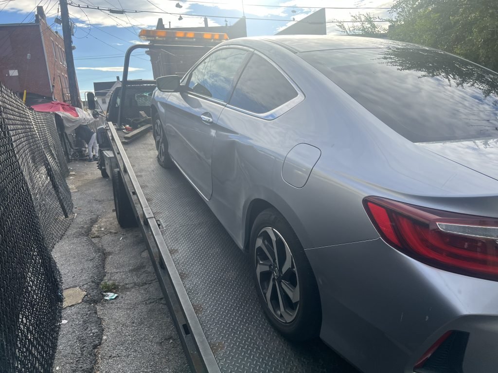 I Got Whipz Towing & Roadside Assistance with a grey honda coupe towing near me from 2000 Everton RdBaltimore, MD 21209 to 5211 Reisterstown Rd, Baltimore, MD 21215