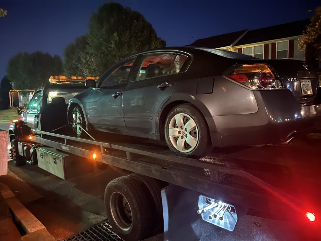 I Got Whipz Towing & Roadside Assistance with a grey nissan altima towing near me from 2205 Riding Crop Way Windsor Mill, MD 21244 to 2161 York Rd Timonium, MD 21093