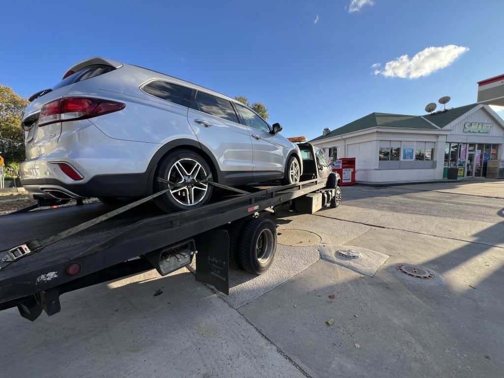 I Got Whipz Towing & Roadside Assistance with a white hyundai santa fe towing near me from 607 Frederick Rd, Catonsville, MD 21228 to 6415 Baltimore National Pike, Catonsville, MD 21228