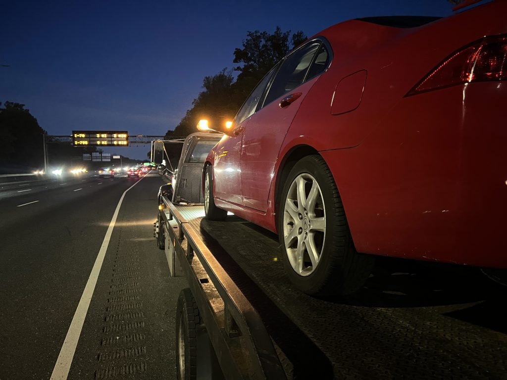 I Got Whipz Towing & Roadside Assistance with a red acura tlx towing near me from 39.264029, -76.709454 to 5317 Edmondson Ave, Baltimore, MD 21229