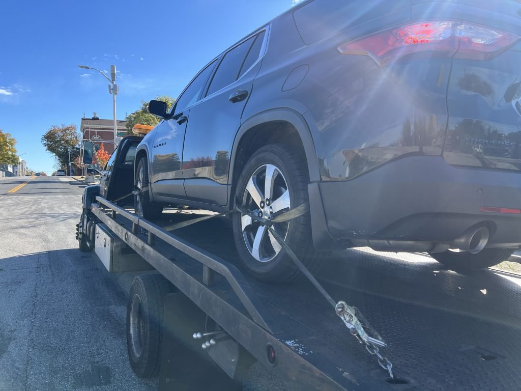 I Got Whipz Towing & Roadside Assistance with a blk chevy traverse truck towing near me from 309 E Chase St, Baltimore, MD 21202 to 6633 Security Blvd, Woodlawn, MD 21207