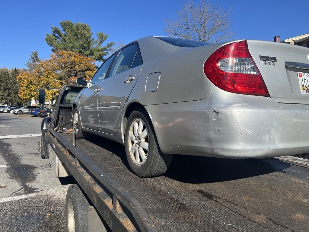 I Got Whipz Towing & Roadside Assistance with a grey toyota camry sedan towing near me from 9698 Southall Rd, Randallstown, MD 21133 to 4120 W Belvedere Ave, Baltimore, MD 21215