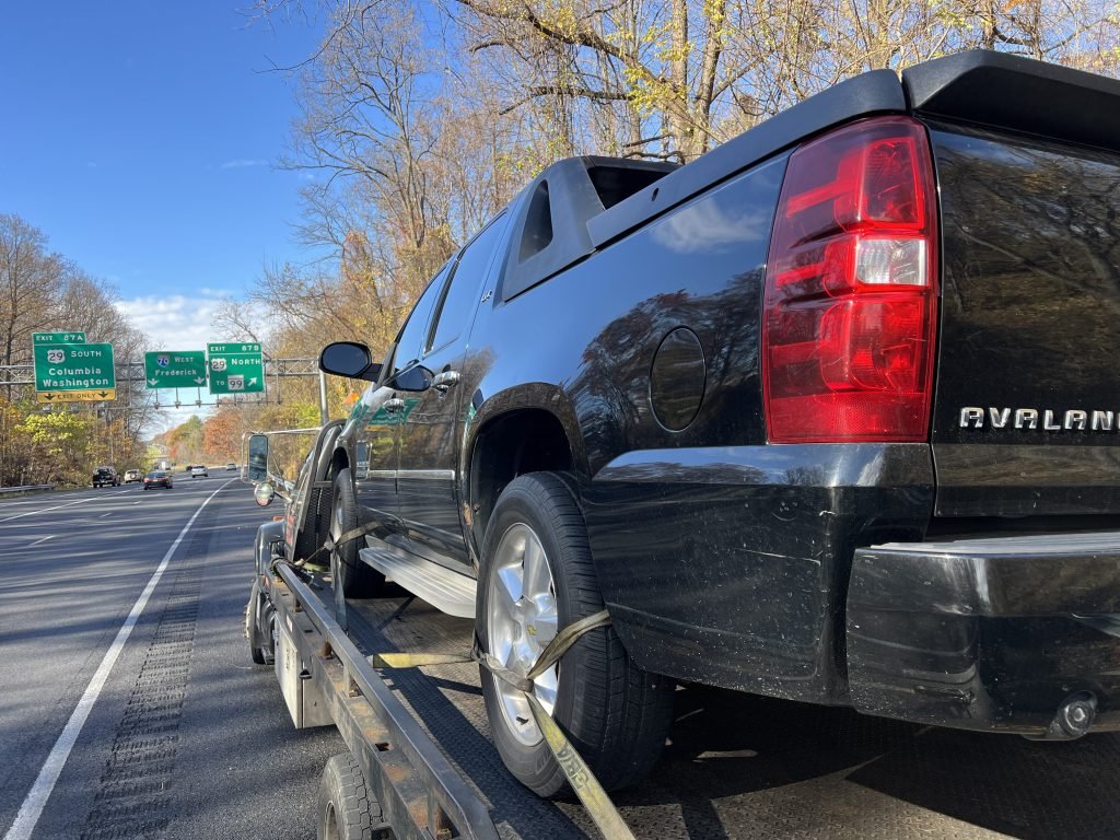 I Got Whipz Towing & Roadside Assistance with a blk chevy avalanche truck towing near me from 39.304078, -76.797016 to 28600 Kemptown Rd, Damascus, MD 20872