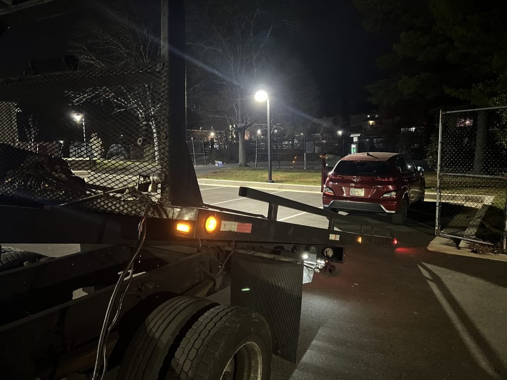 I Got Whipz Towing & Roadside Assistance with a red hyundai hybrid kona sedan towing near me from 39.3459098,-76.7742167 to 2121 Gwynn Oak Ave, Gwynn Oak, MD 21207