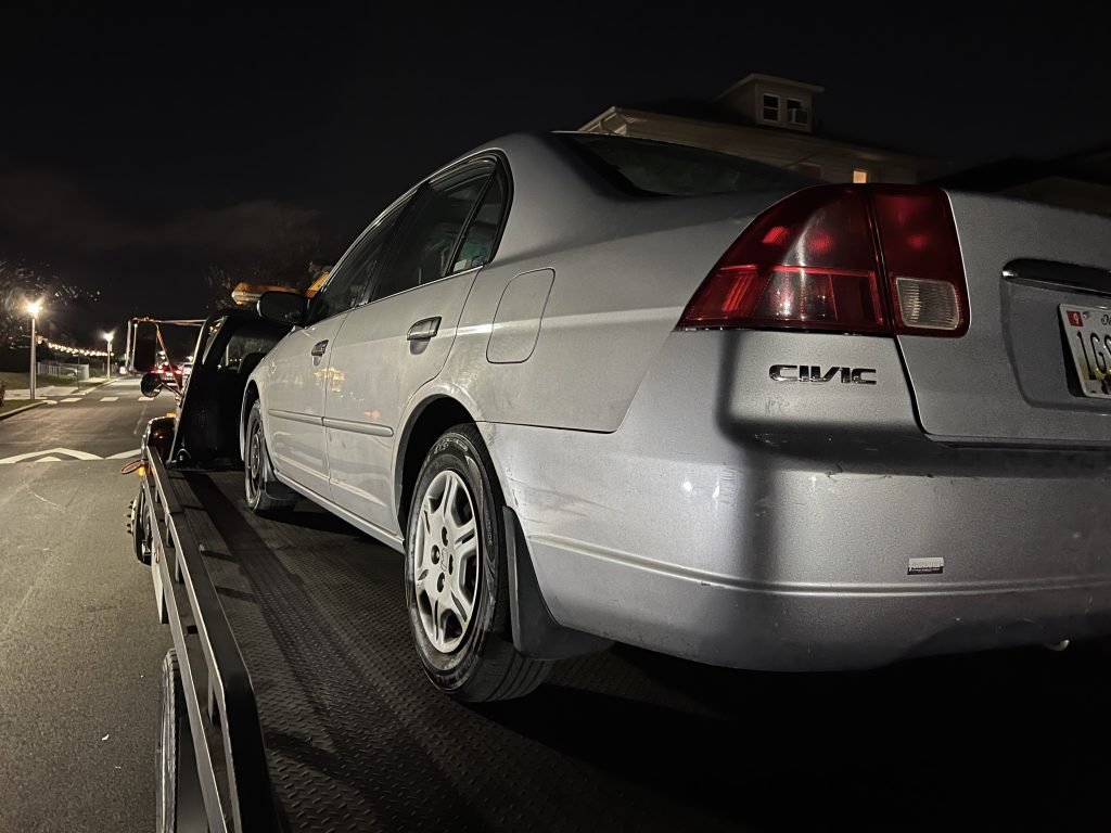 I Got Whipz Towing & Roadside Assistance with a grey honda civic sedan towing near me from 3548 Granada Ave Gwynn Oak, MD 21207 to 39.3425338,-76.6842433