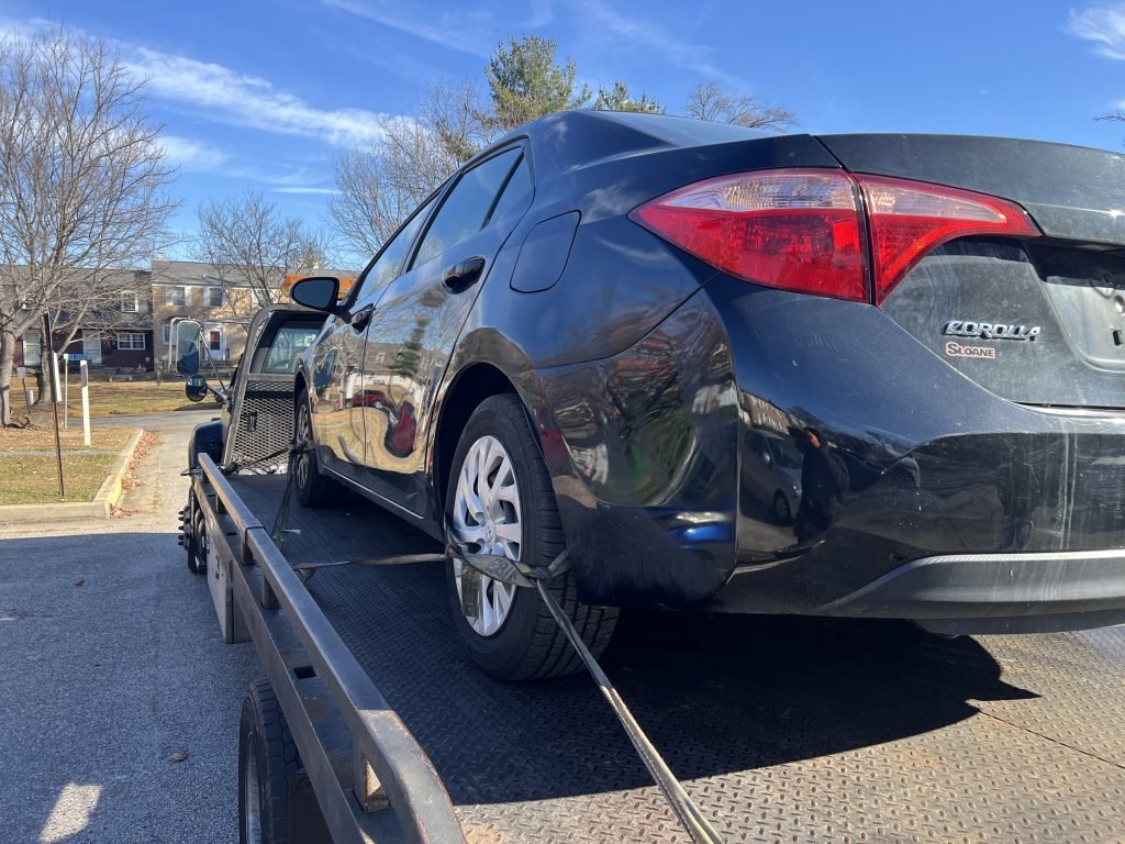 I Got Whipz Towing & Roadside Assistance with a black toyota corolla sedan towing near me from 1 Walden Birch Ct Woodlawn, MD 21207