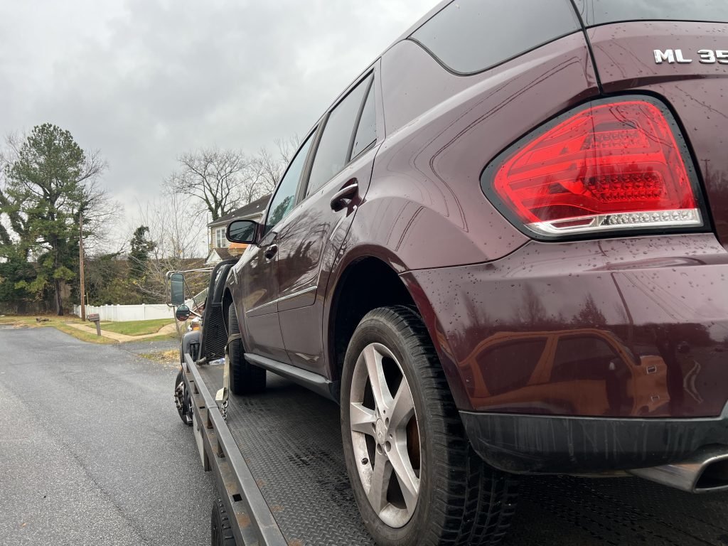I Got Whipz Towing & Roadside Assistance with a red mercedes ml350 truck towing near me from 3435 Liberty Gardens rd Windsor Mill, MD 21244 to 7600 Clays Ln Suite A, Windsor Mill, MD 21244