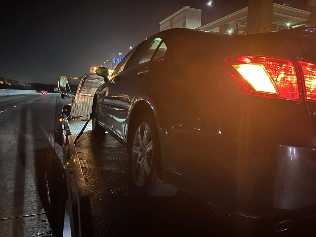 I Got Whipz Towing & Roadside Assistance with a black lexus es350 sedan towing near me from 39.407276, -76.780269 to 2800 Wilkens Ave, Baltimore, MD 21229