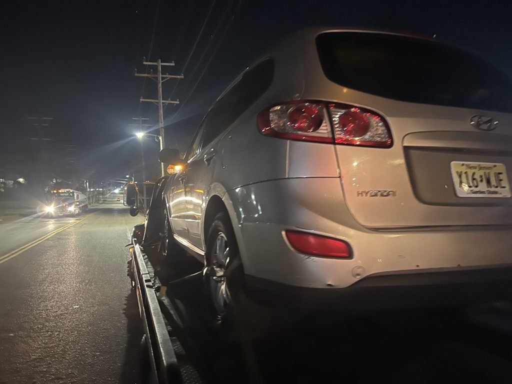 I Got Whipz Towing & Roadside Assistance with a silver hyundaic Santa Fe suv towing near me from 1525 E Patapsco Ave, Baltimore, MD 21230 to 4200 56th ave Bladensburg, MD 20710