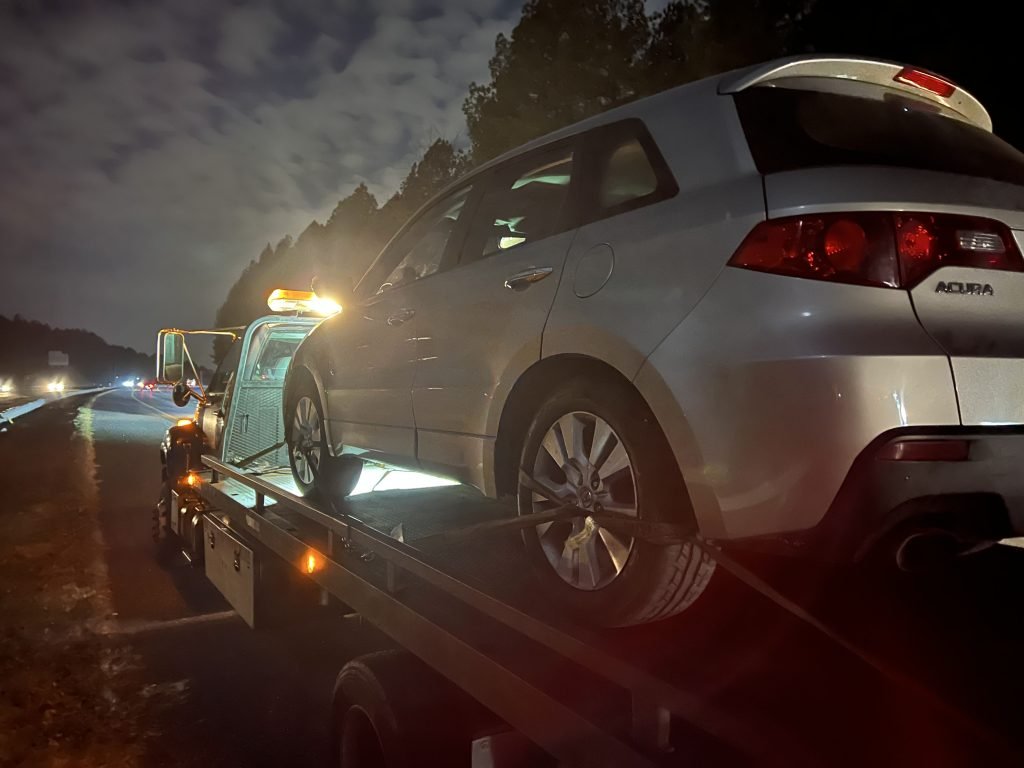 I Got Whipz Towing & Roadside Assistance with a white Acura MDX suv towing near me from 39.078455,-76.628202 to 5330 Frankford Ave, Baltimore, MD 21206