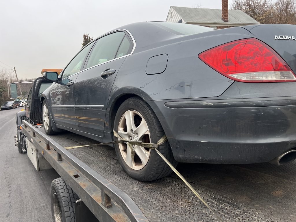 I Got Whipz Towing & Roadside Assistance with a grey acura rl sedan towing near me from 4404 Pen Lucy Rd Baltimore, MD 21229 to 1017 Leslie Ave, Catonsville, MD 21228