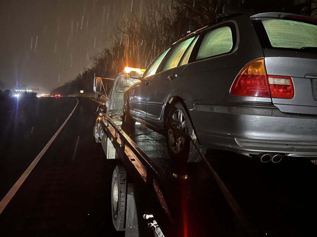 I Got Whipz Towing & Roadside Assistance with a grey bmw 5 series wagon towing near me from 39.308037, -76.756727 to 225 N Castle St Baltimore, MD 21231