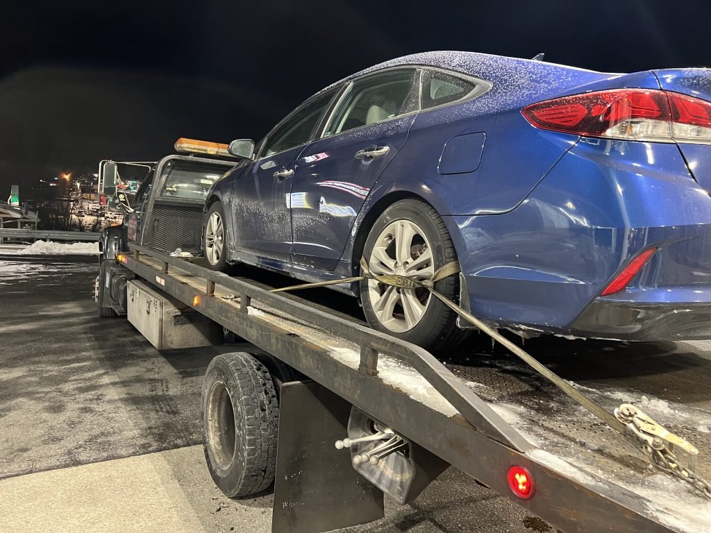 I Got Whipz Towing & Roadside Assistance with a blue hyundai sonata sedan towing near me from 8506 Baltimore National Pike, Ellicott City, MD 21043 to 2104 Ashburton st Baltimore, MD 21216