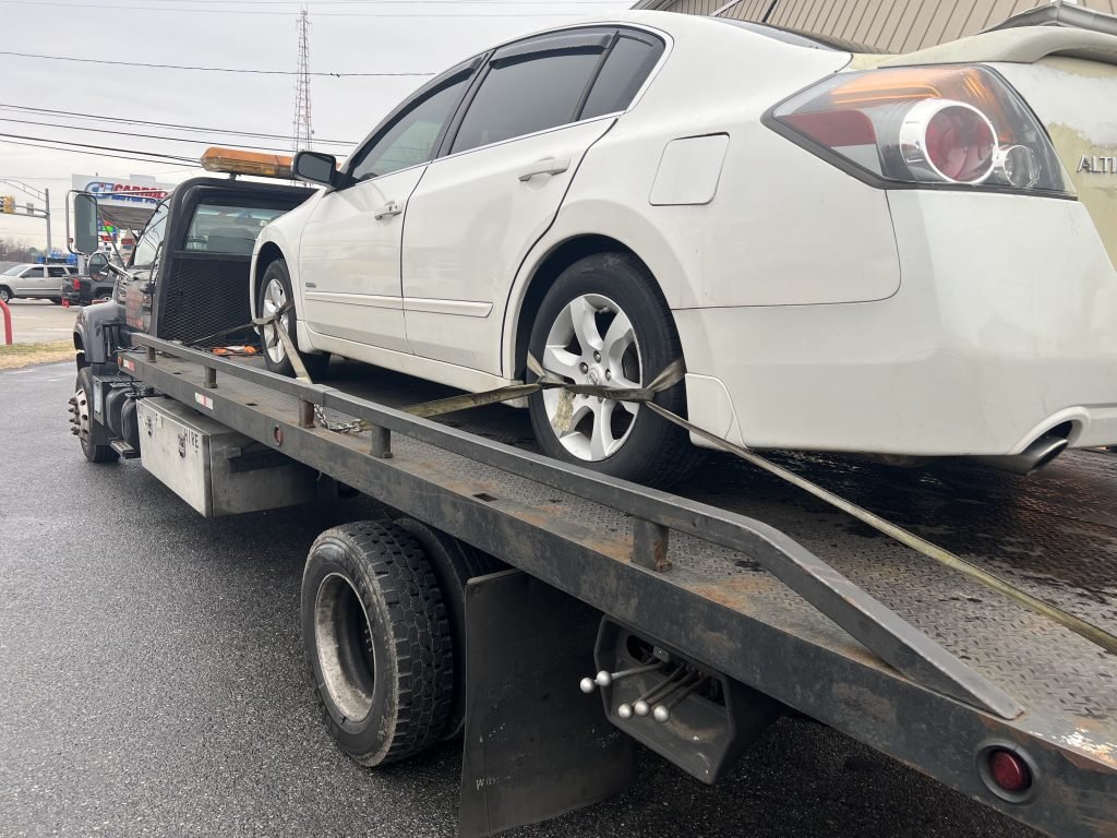 I Got Whipz Towing & Roadside Assistance with a white nissan altima sedan towing near me from 6013 Baltimore National Pike, Catonsville, MD 21228 to 2085 York Rd, Timonium, MD 21093