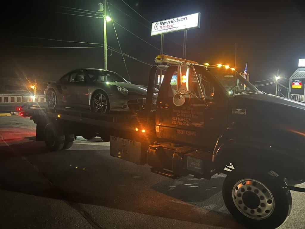 I Got Whipz Towing & Roadside Assistance with a grey porsche 911 coupe towing near me from 1020 Liberty rd Eldersburg, MD 21784 to 3306 Baltimore Blvd Finksburg, MD 21048