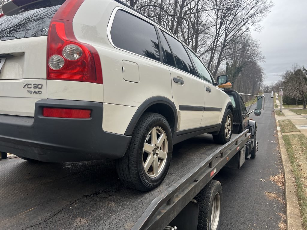 I Got Whipz Towing & Roadside Assistance with a white volvo xc90 suv towing near me from 3698 Parkview Ave, Gwynn Oak, MD 21207 to 3625 Woodland Ave, Baltimore, MD 21215