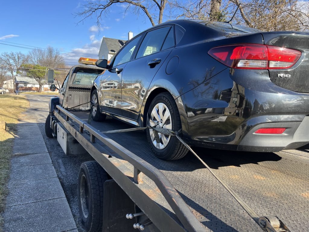 I Got Whipz Towing & Roadside Assistance with a black kia rio sedan towing near me from 6741 Windsor Mill Rd Lochearn, Maryland 21207 to 9438 Baltimore National Pike, Ellicott City, MD 21042